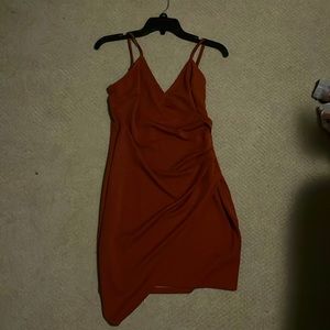 Red/Brown Homecoming Dress. Cinched in the middle and one side is longer